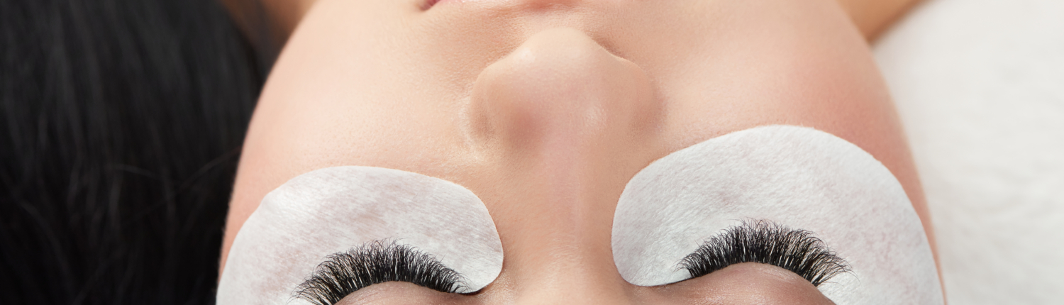 Photo comparison of woman's normal and fake enlarged lashes.